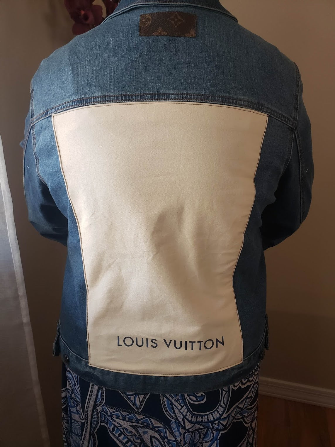 Handmade denim jacket with Louis Vuitton dustbag.